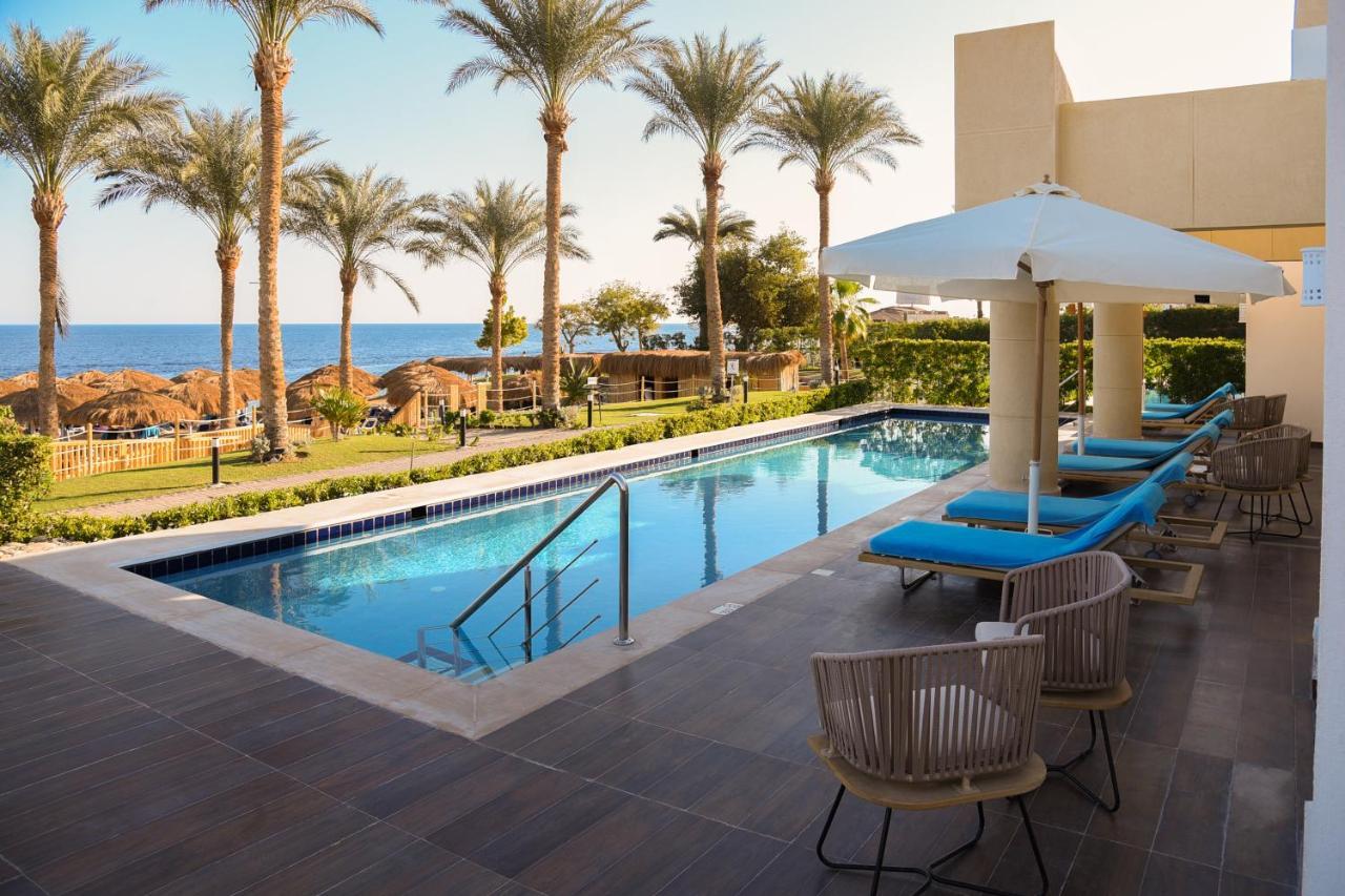Sunrise Diamond Beach Resort -Grand Select Sharm el Sheikh Esterno foto The swimming pool at the St. Regis Sharm