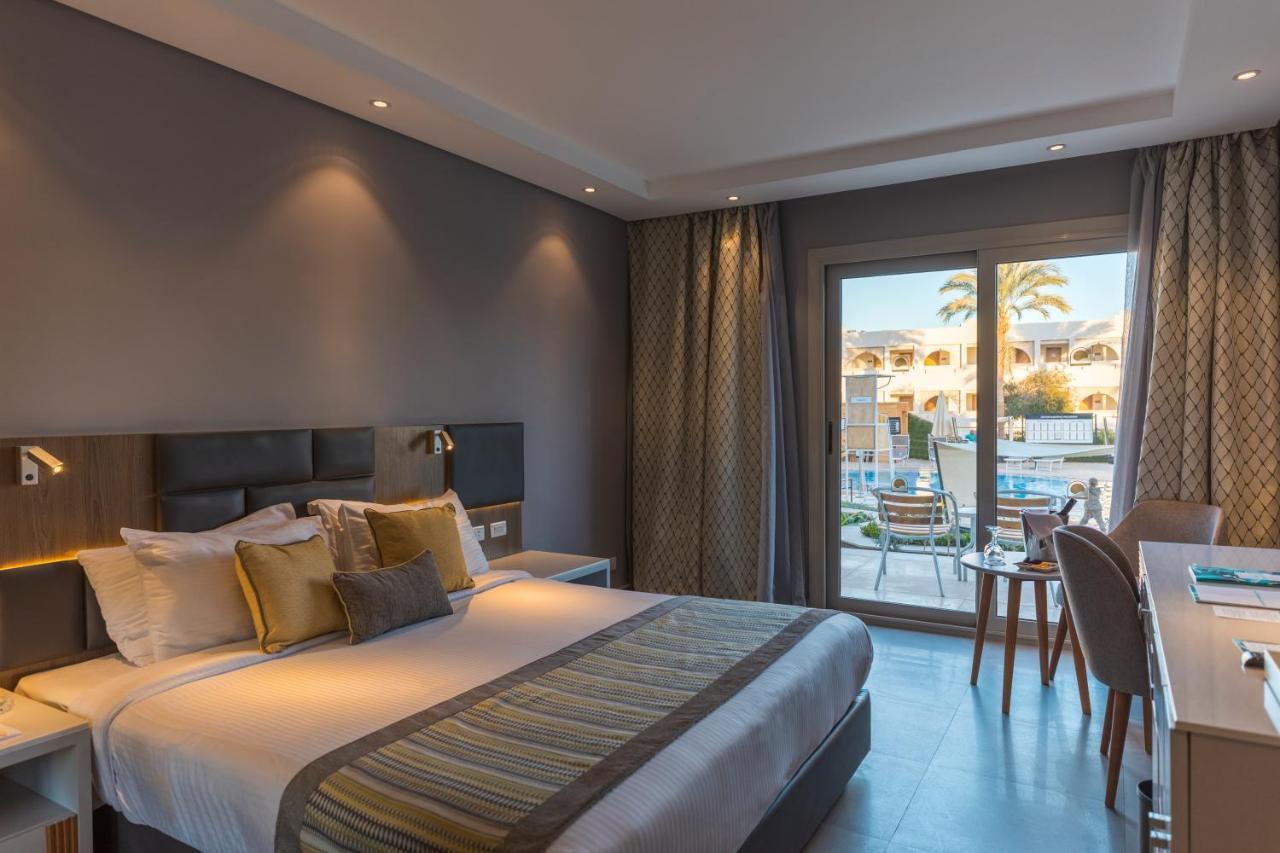 Sunrise Diamond Beach Resort -Grand Select Sharm el Sheikh Esterno foto A room at the hotel